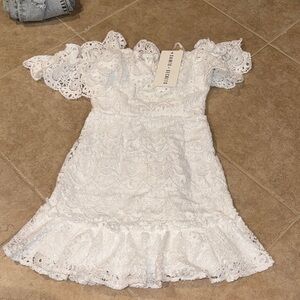 Saints and Secrets off the shoulder dress